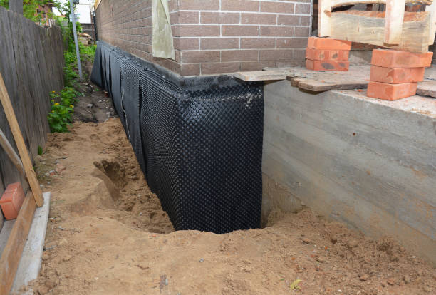 Happy homeowners after waterproofing job in Rocky Hill